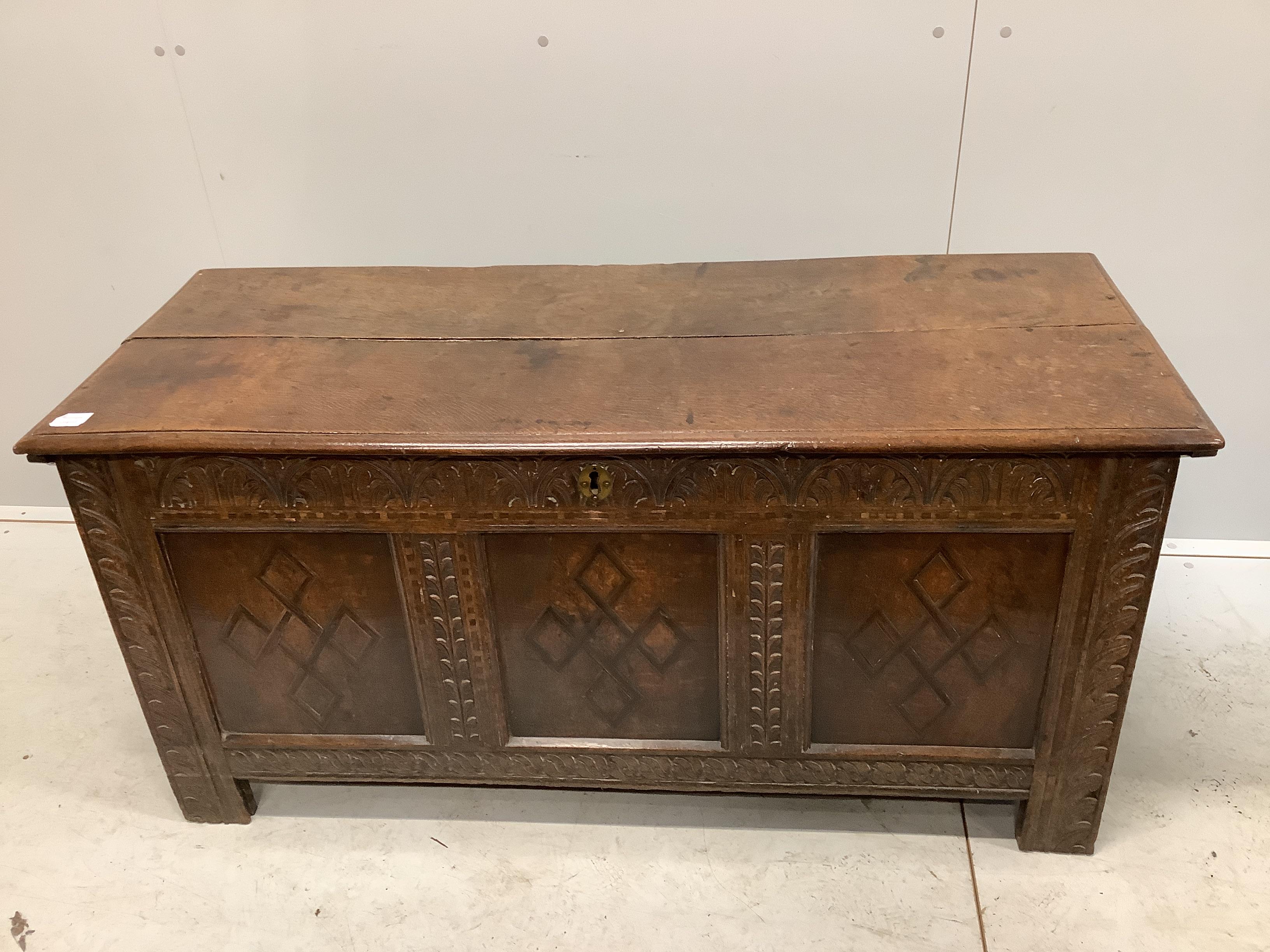 A 17th century oak coffer, width 133cm, depth 53cm, height 63cm	